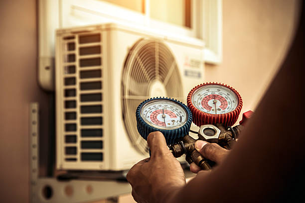 Professional Heat Pump Repair technician working in Janesville, WI